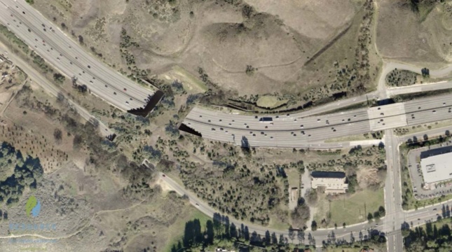 Aerial rendering of a wildlife crossing over a highway