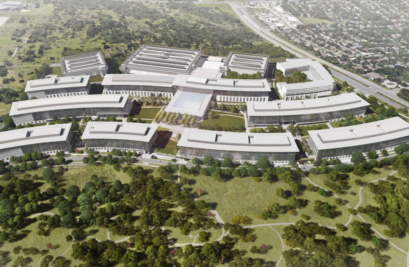 描述10个蜿蜒的白色办公室块的新的德克萨斯苹果园区的空中渲染