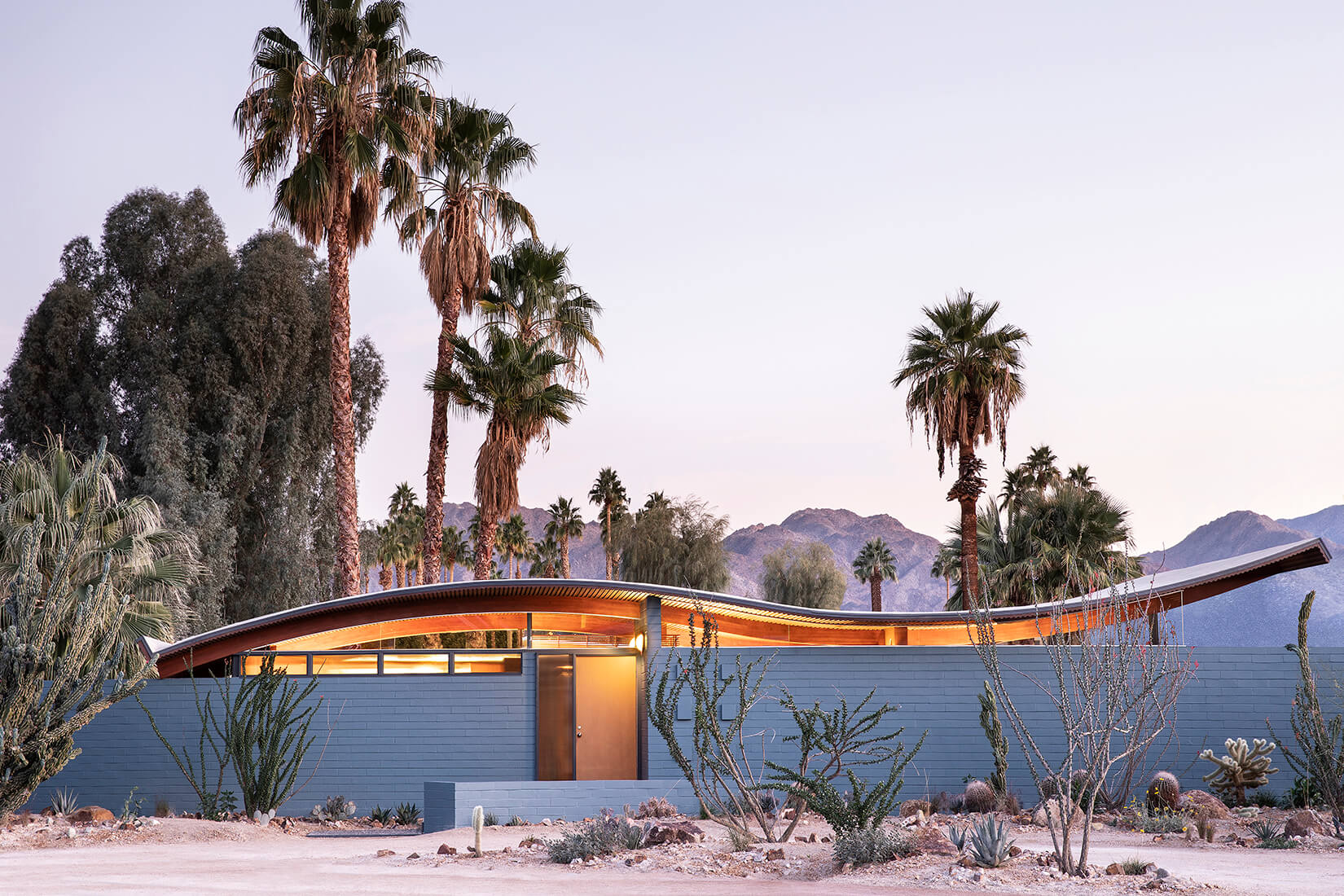photograph of a midcentury California home with a wavy roof
