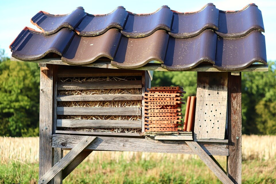 artificial hives under a tile roof